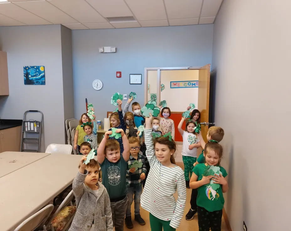 a group of children in a classroom