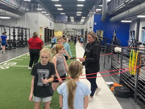 a group of people in a gym