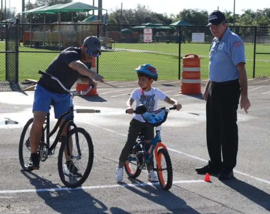 a man and a boy on bicycles