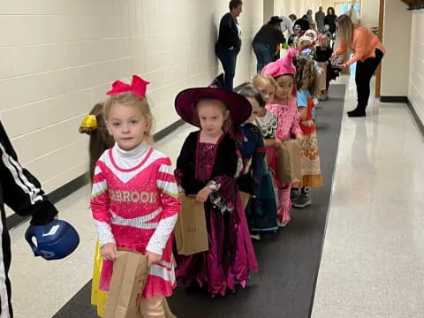 a group of children in clothing