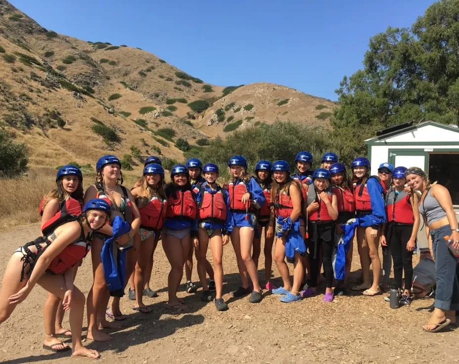 a group of people wearing helmets