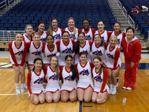 a group of people in red uniforms