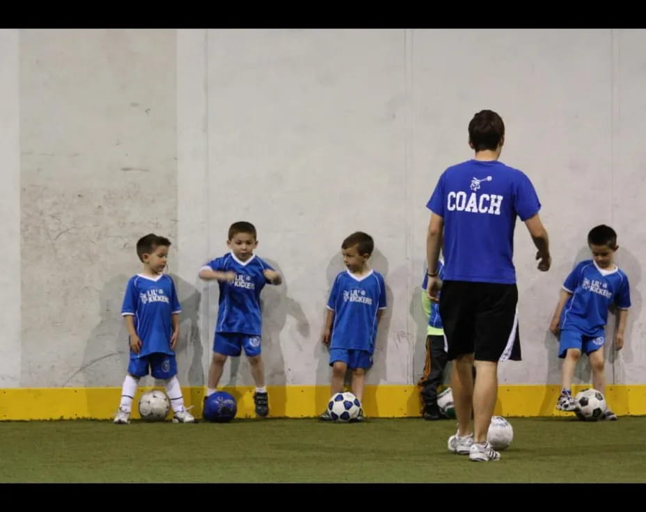 a group of boys in blue uniforms