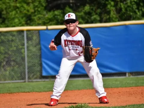 a baseball player pitching a ball