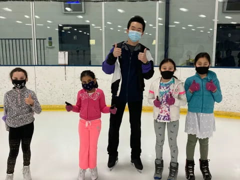a person on ice skates with kids