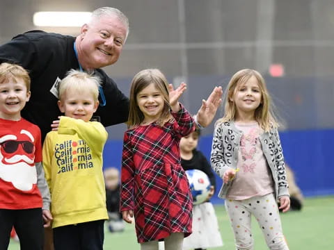 a person and a group of children