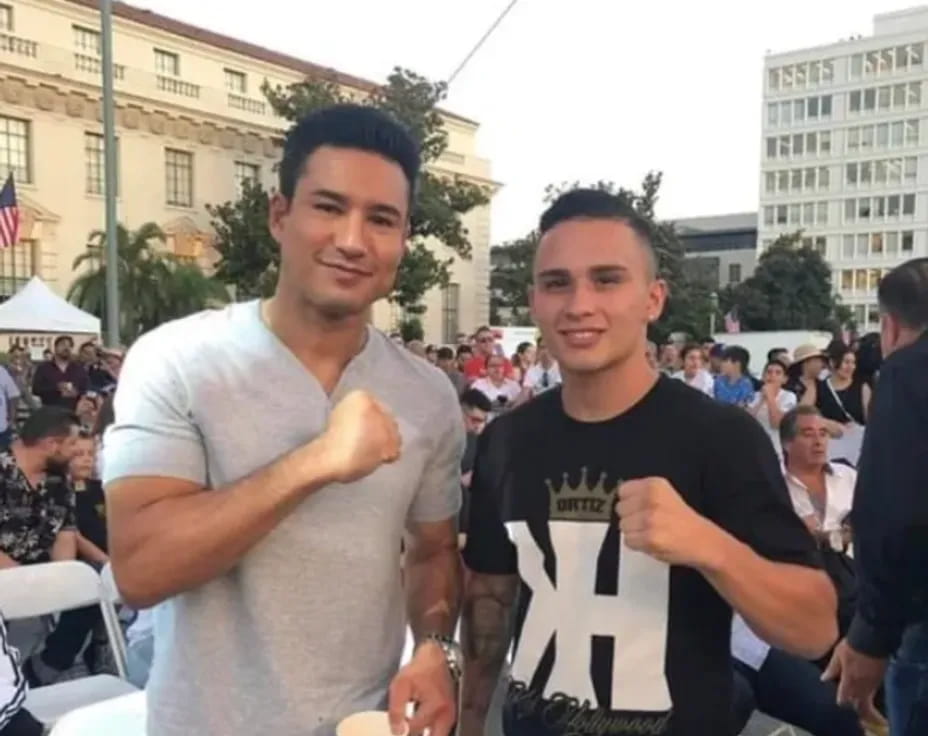 two men posing for a picture