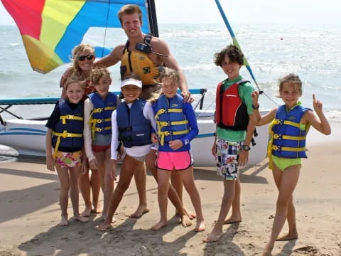 a group of people on a beach