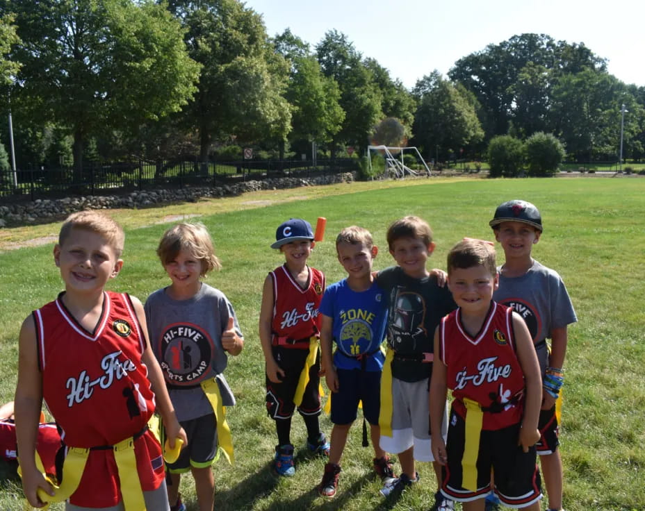 a group of boys in sports uniforms