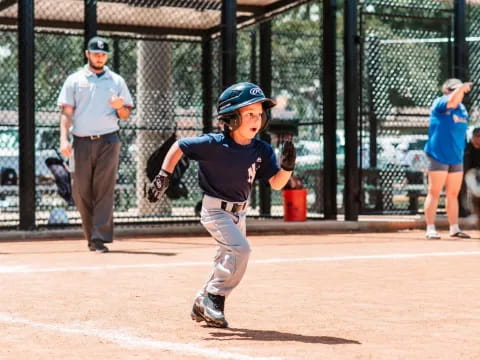 a young boy playing baseball