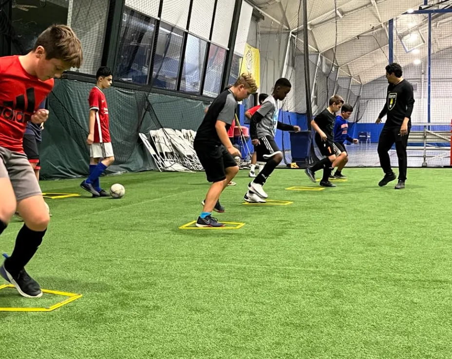 a group of people play football