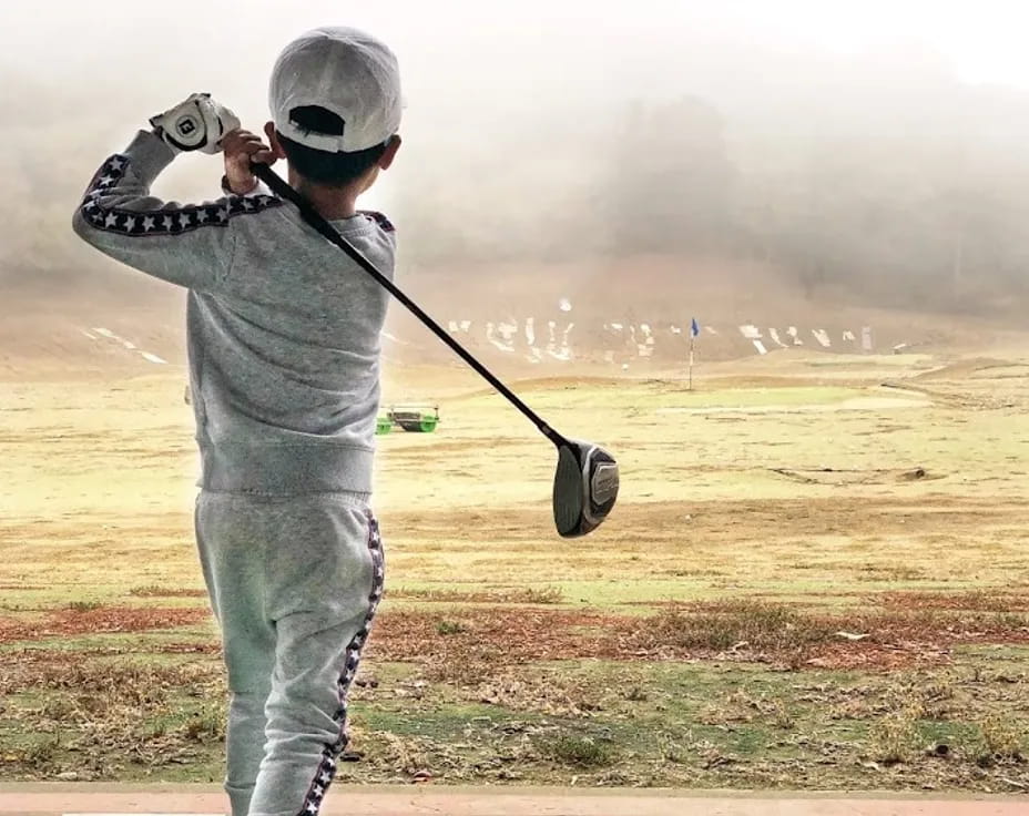 a man playing golf