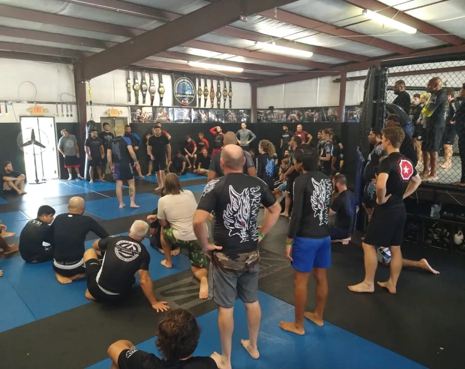 a group of people in a gym