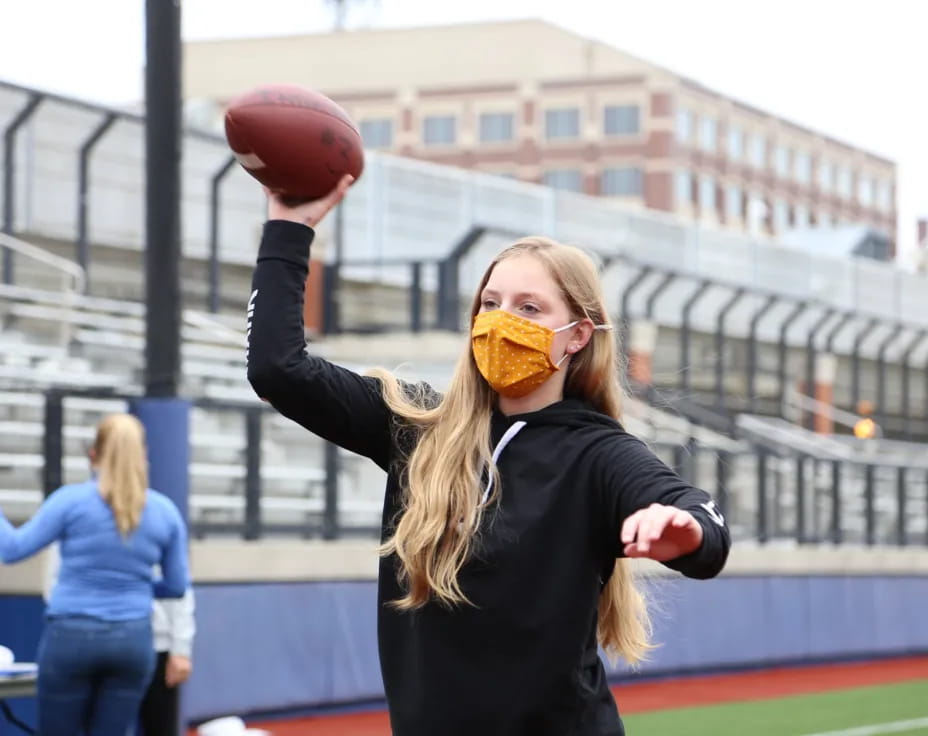 a person throwing a football