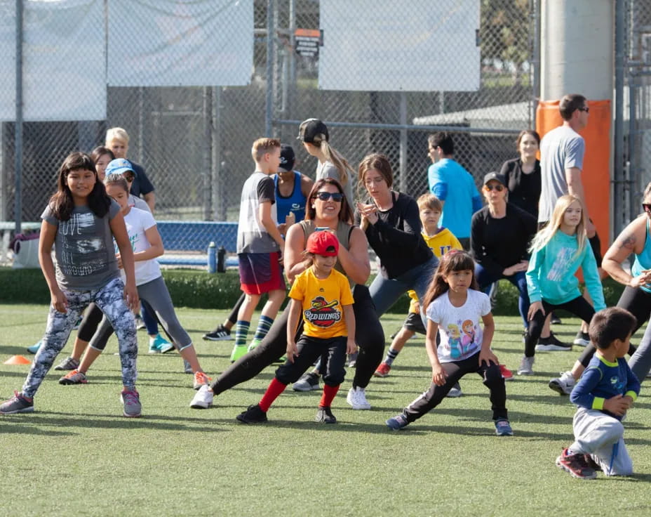 a group of kids playing football