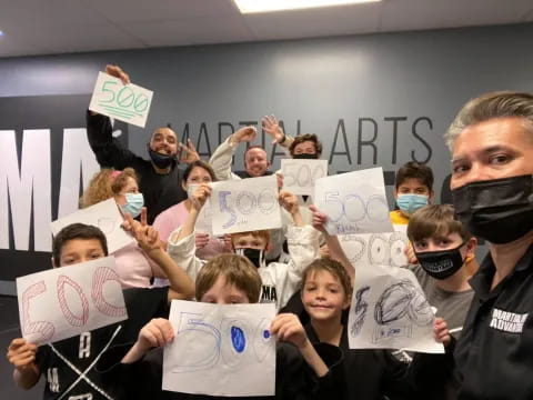 a group of people holding signs