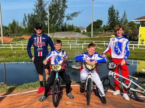 a group of boys on bicycles