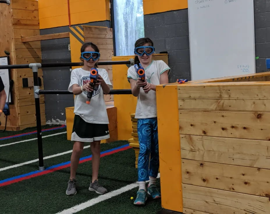 a couple of boys wearing goggles