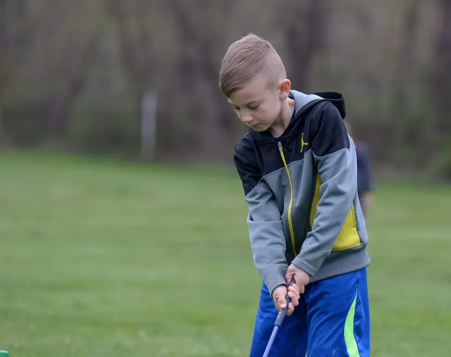 a boy in a field