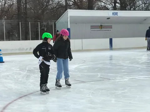 a couple of girls on ice