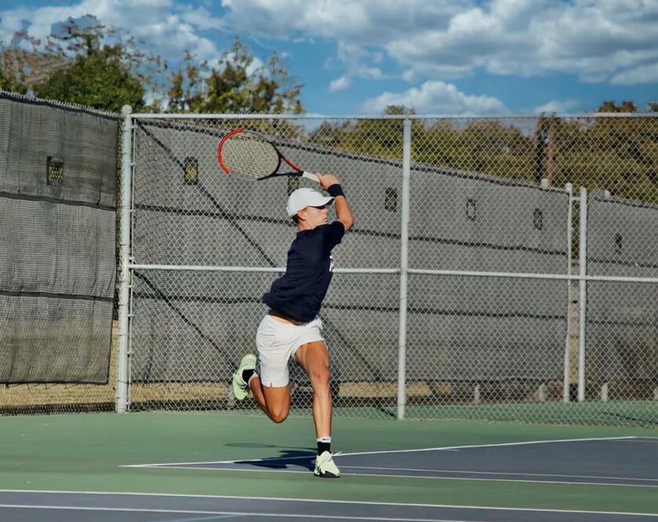 a man playing tennis