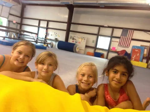 a group of girls in a pool