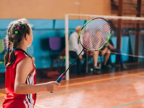 a girl playing tennis