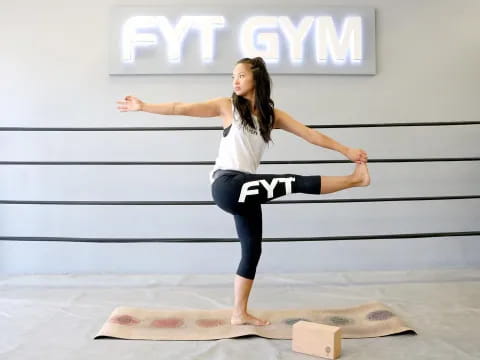 a woman doing yoga