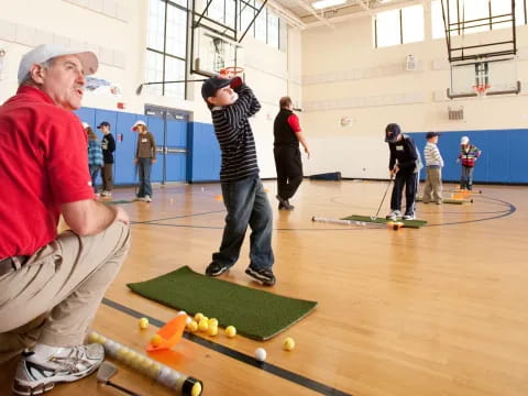 a group of people playing pool
