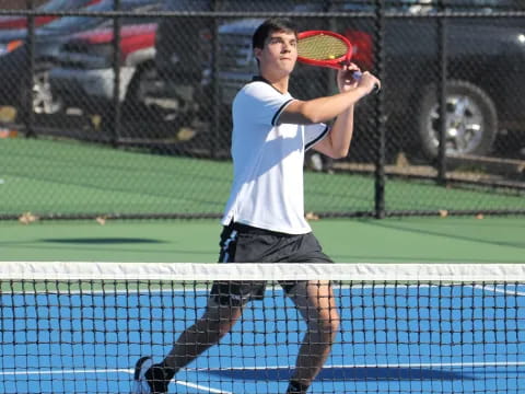 a person playing tennis