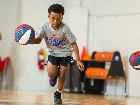 a boy playing volleyball
