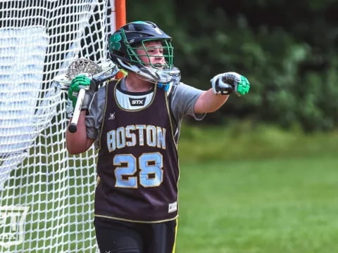 a person playing lacrosse