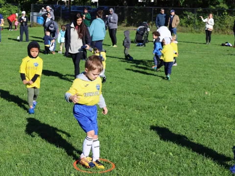 kids playing football on a field