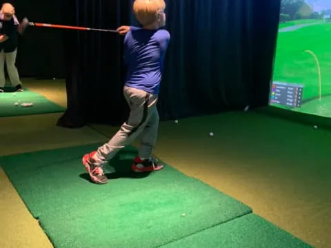 a person playing golf