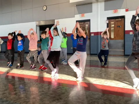 a group of children dancing