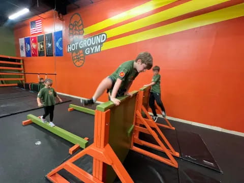a group of kids playing pool
