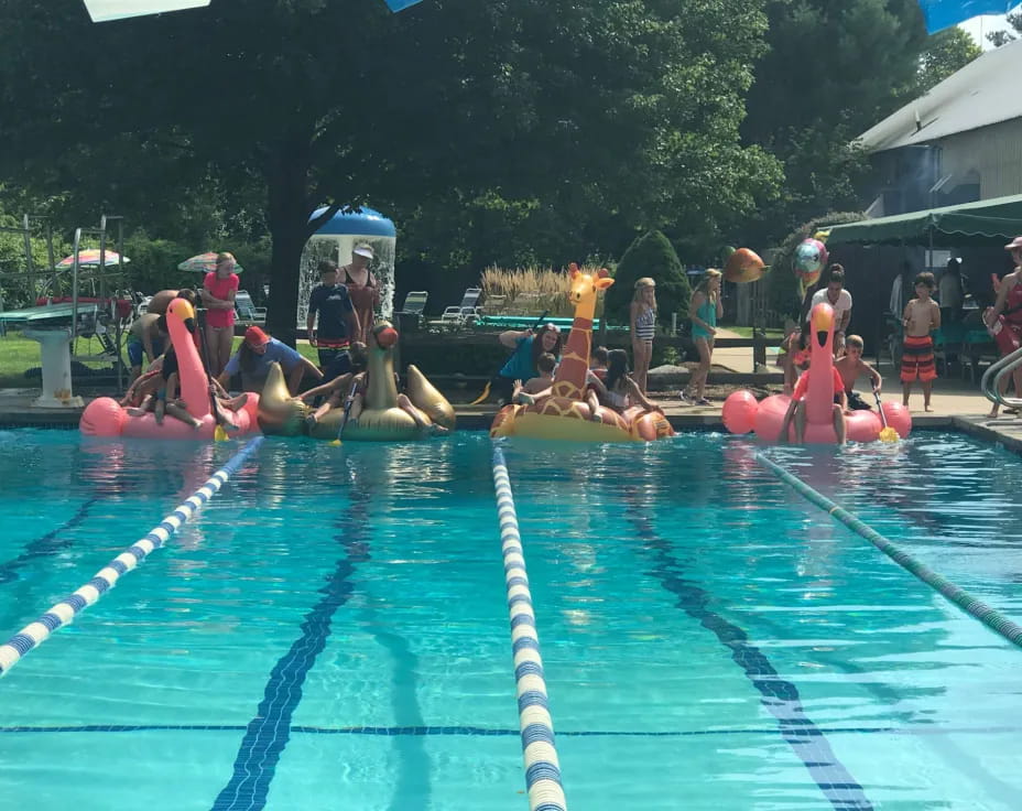 a group of people in a pool