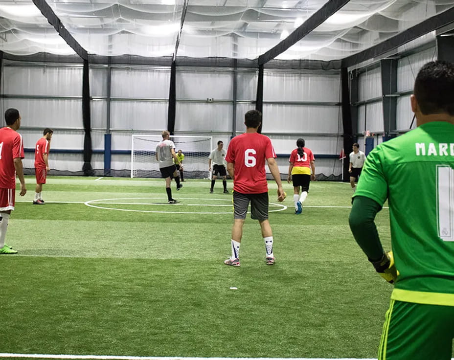 a group of men playing football