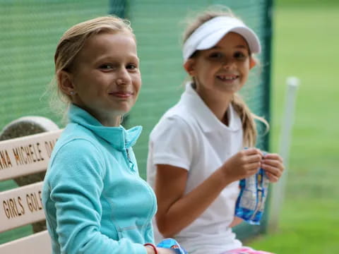 a couple of girls smiling
