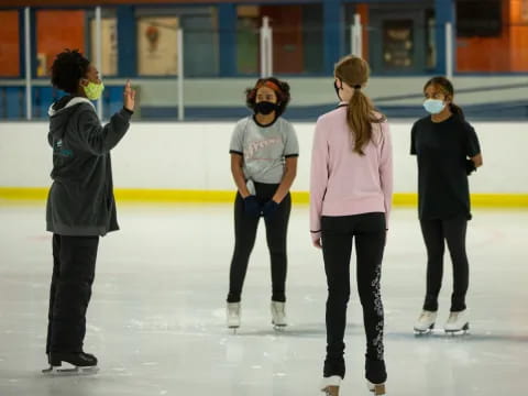 a group of people wearing masks