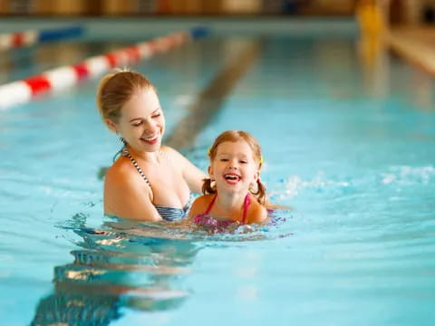 two girls in a pool