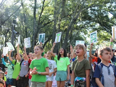 a group of people holding signs