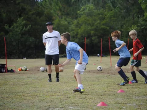 a group of kids playing football