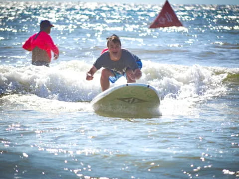 a person surfing on the waves