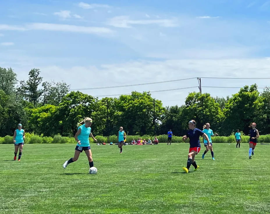a group of people playing football