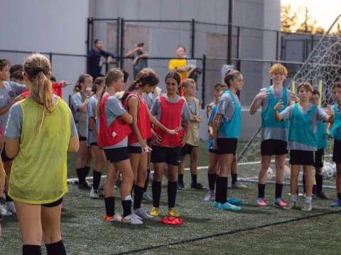 a group of girls in a sport field