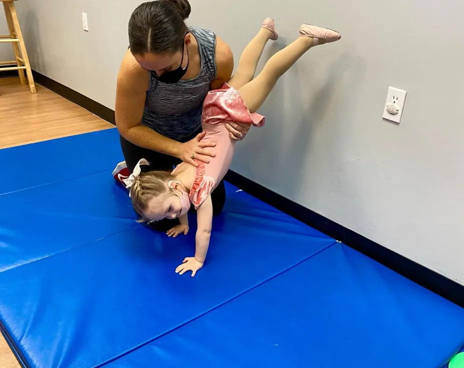 a person holding a baby