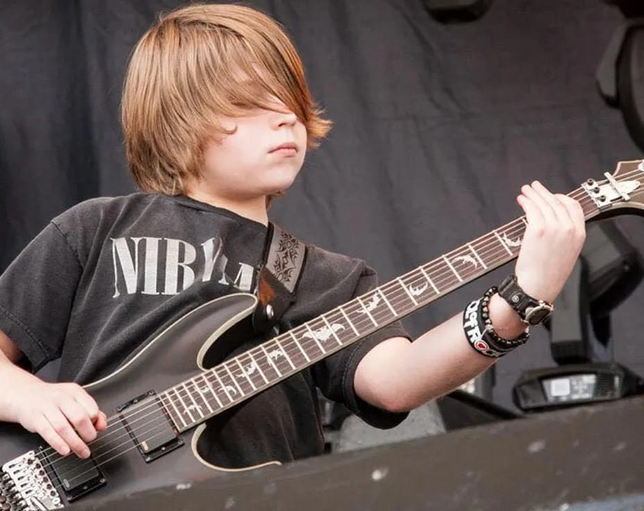 a person playing a guitar