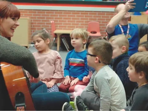 a person and a group of children