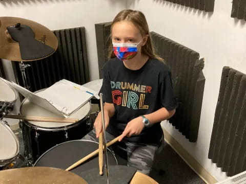 a person playing drums